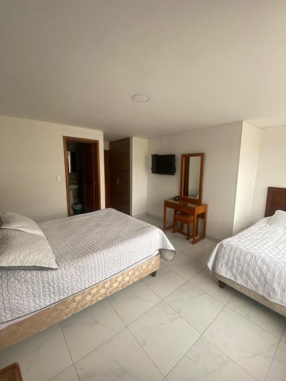 Deluxe Triple Room room - Image 1