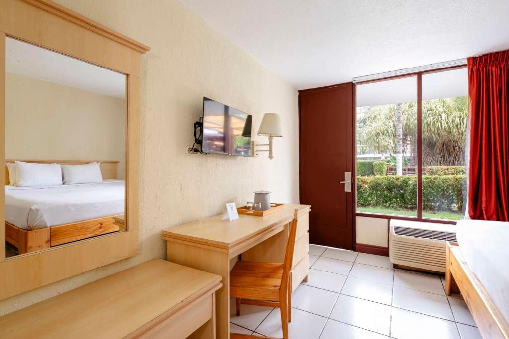 Room with One Double and One Single Bed and Garden View - Non-Smoking room - Image 2