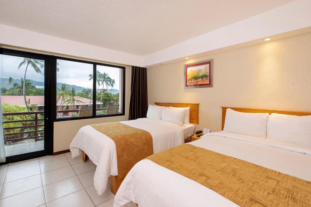 Double Room with Two Double Beds, Balcony and Pool View - Non-Smoking room - Image 1