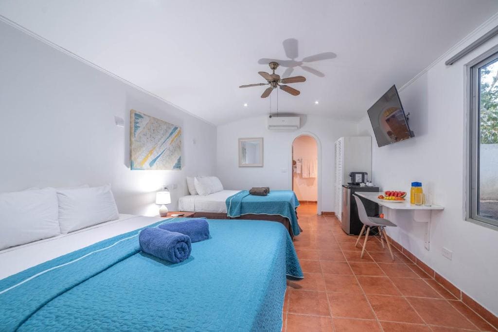 Deluxe Queen Room with Two Queen Beds room - Image 1