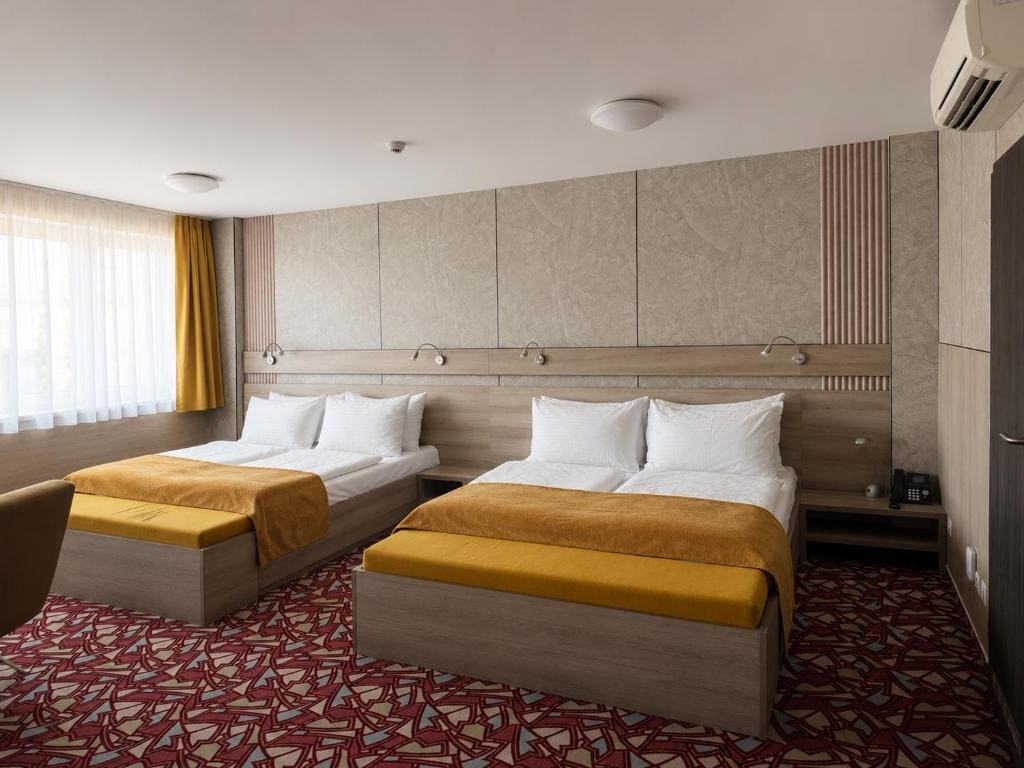 Deluxe Queen Room with Two Queen Beds room - Image 1