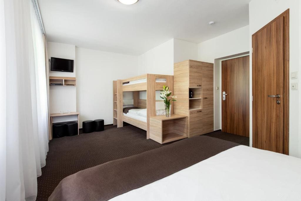 Comfort Triple Room with Balcony room - Image 1
