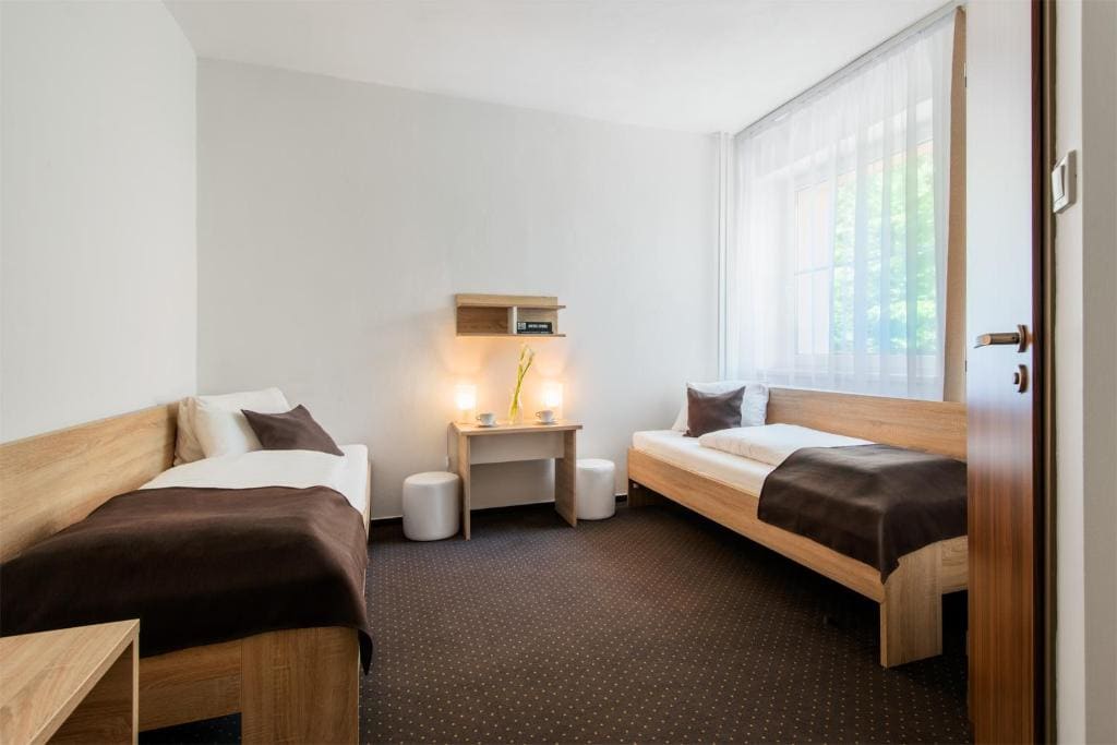 Comfort Triple Room with Balcony room - Image 2