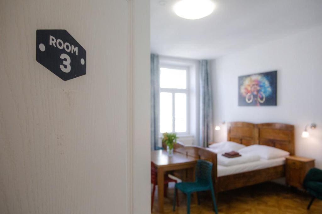 Quadruple Room with Private Toliet and Shared Bathroom room - Image 2