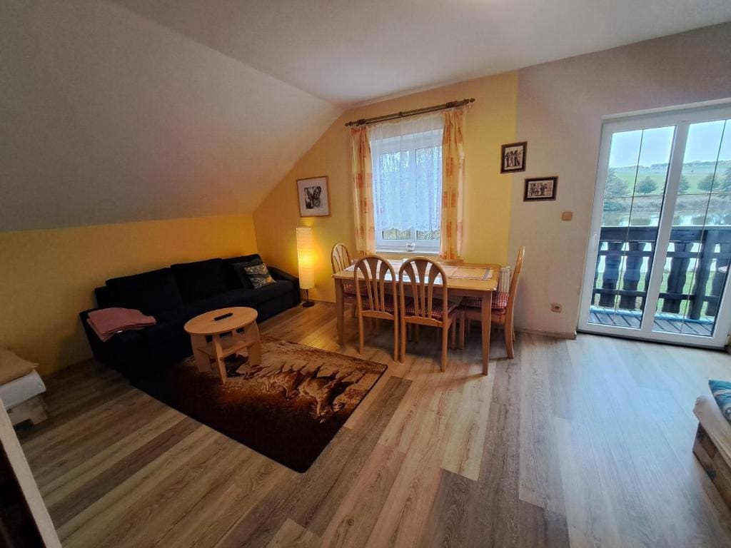 One-Bedroom Apartment with Balcony and Water View room - Image 1