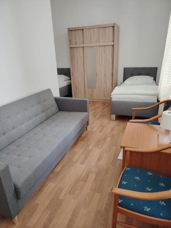 Quadruple Room with Private Bathroom room - Image 1