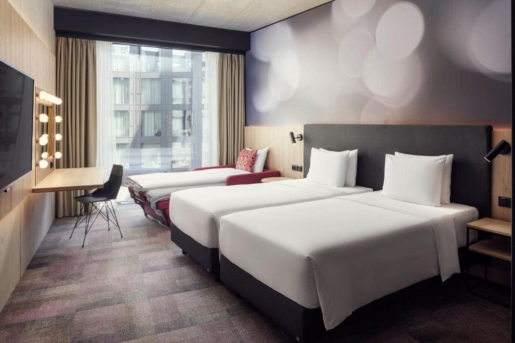 Comfort Triple Room with Two Twin Beds and Fold-Out Chair room - Image 2