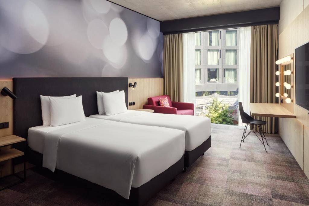 Comfort Triple Room with Two Twin Beds and Fold-Out Chair room - Image 3