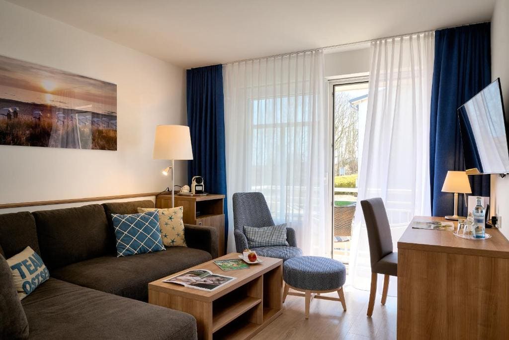 Suite with Balcony and Side View of the Sea room - Image 3