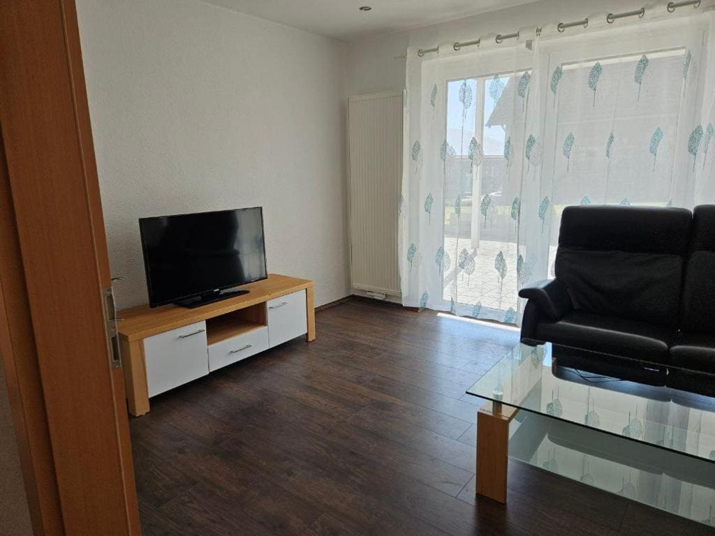 Three-Bedroom Apartment with Balcony room - Image 1