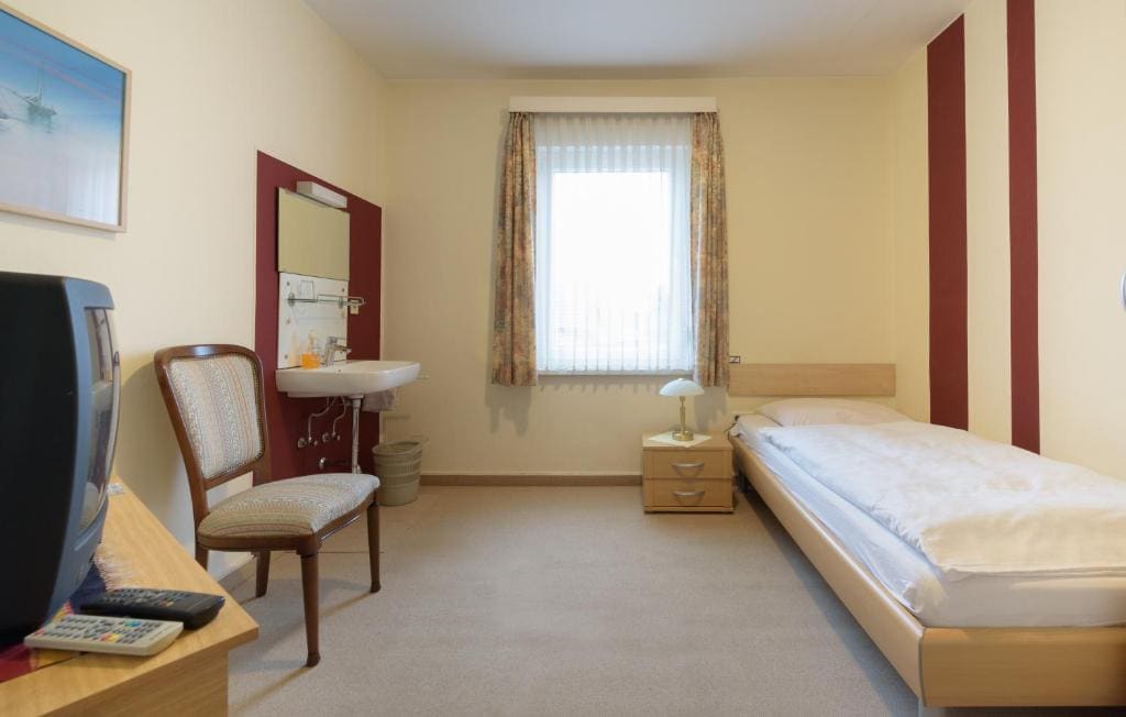 Single Room with Shared Shower and Toilet room - Image 2