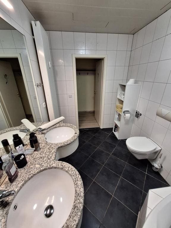 Three-Bedroom Apartment room - Image 3