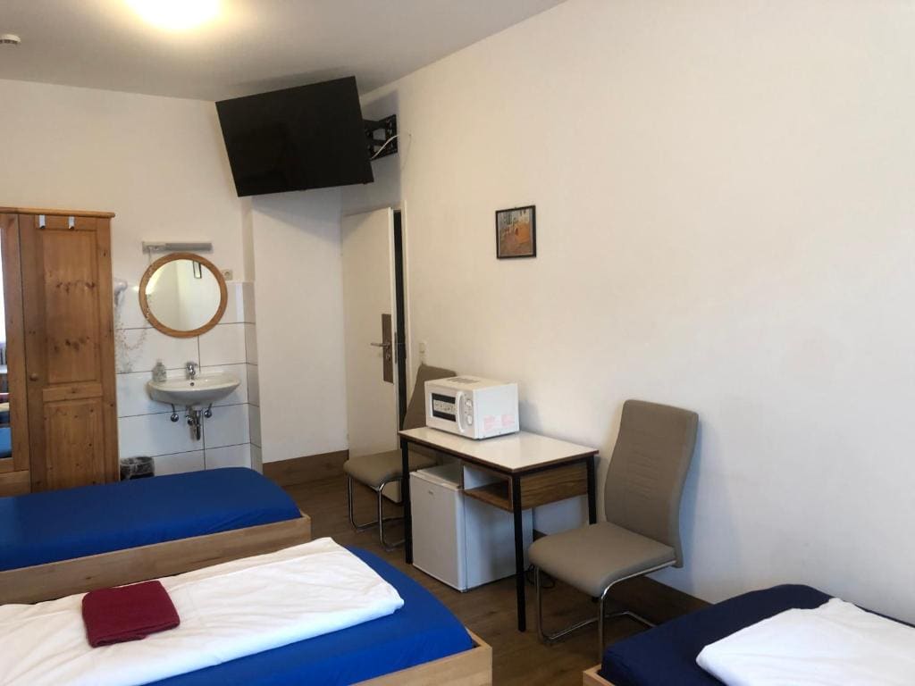 Quadruple Room with Shared Toilet and Shower room - Image 1
