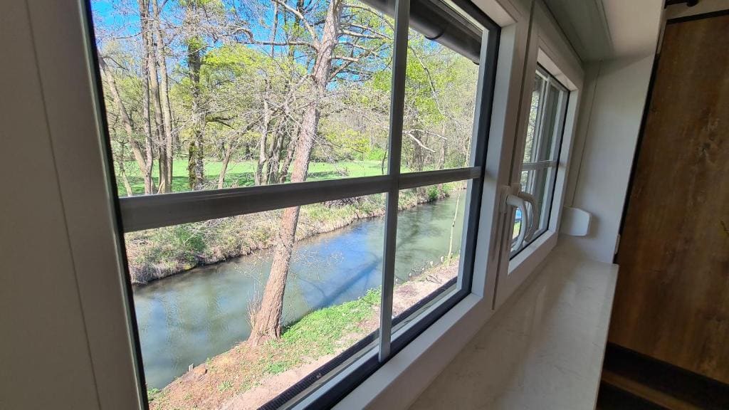 One-Bedroom Apartment with River View room - Image 2