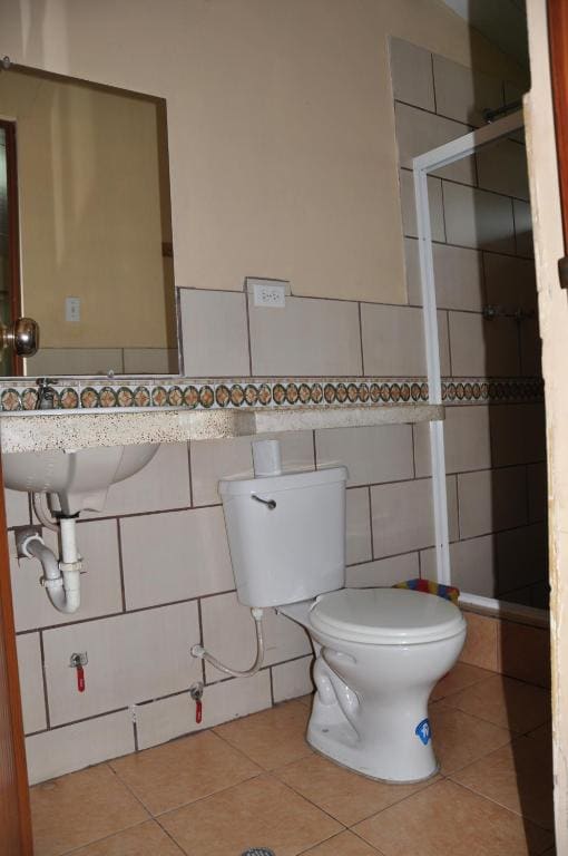 Quadruple Room with Private Bathroom room - Image 1