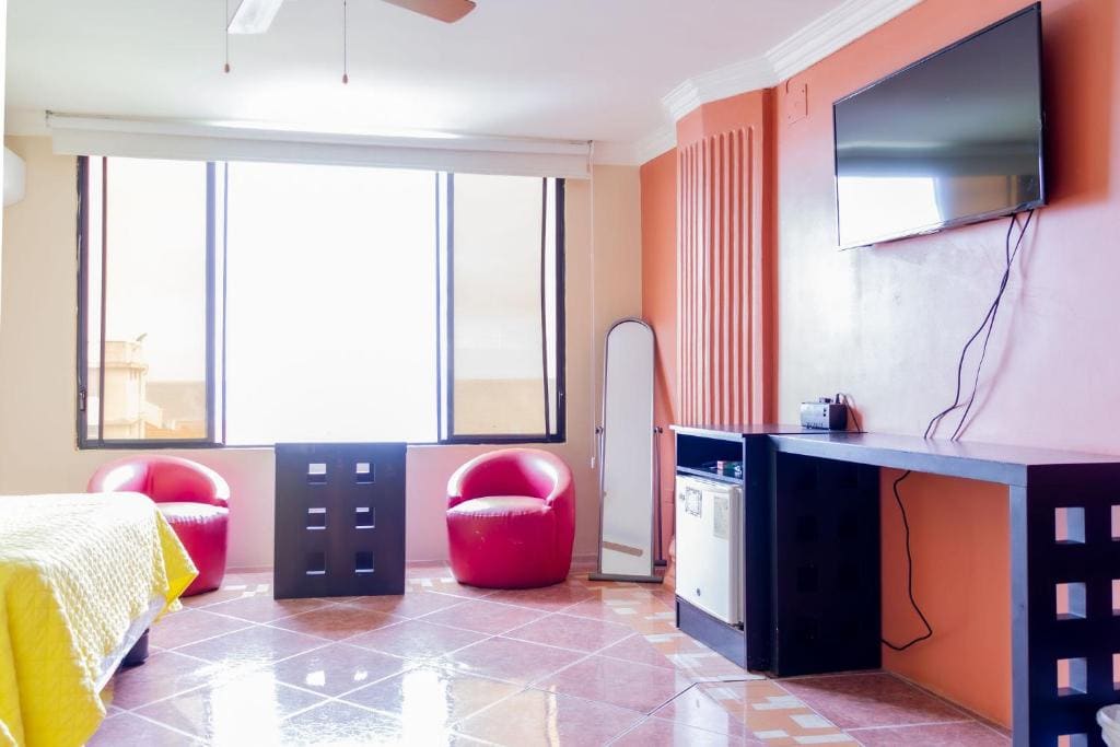 Deluxe Queen Room with Two Queen Beds room - Image 1
