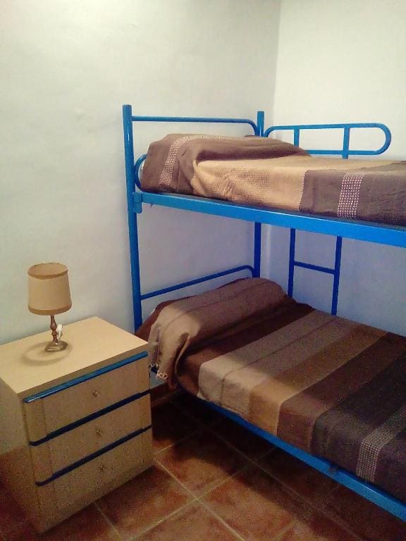 Economy Triple Room with Shared Bathroom room - Image 1