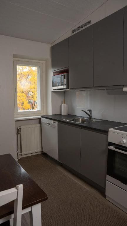 Three-Bedroom Apartment room - Image 3