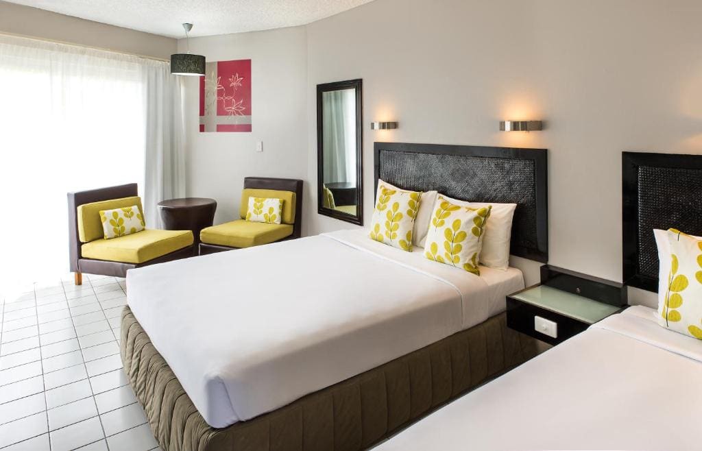 Deluxe Room with Queen and Single Bed room - Image 1