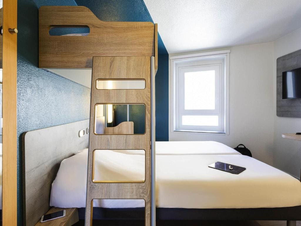 Triple Room with Two Single Beds and One Bunk Bed room - Image 1