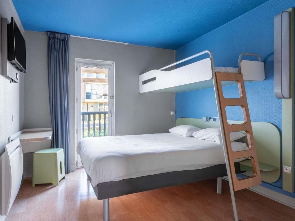 Triple Room with One Double Bed and One Bunk Bed room - Image 1