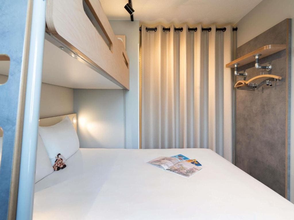 Room with One Queen Bed and One Bunk Bed room - Image 3