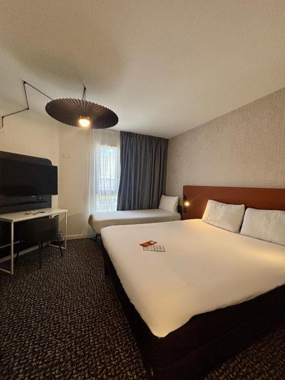 Standard Room with One Double Bed and One Single Bed room - Image 1