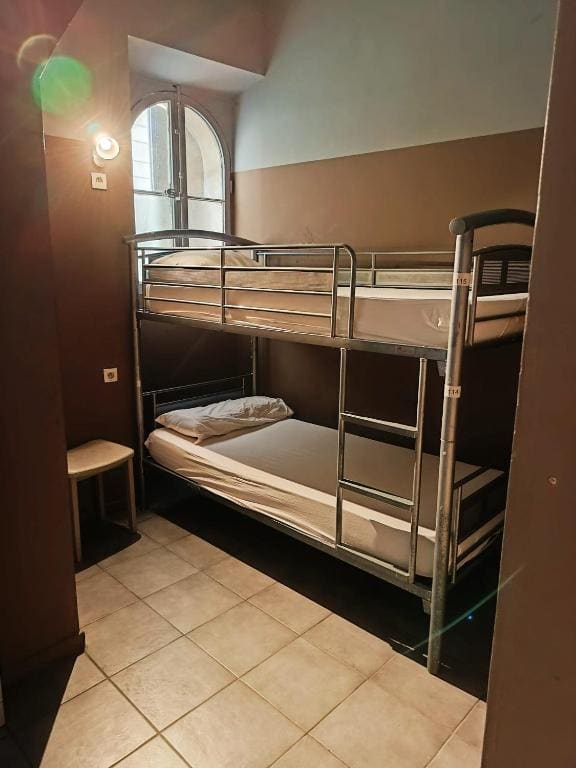 Bed in Male Dormitory Room room - Image 1