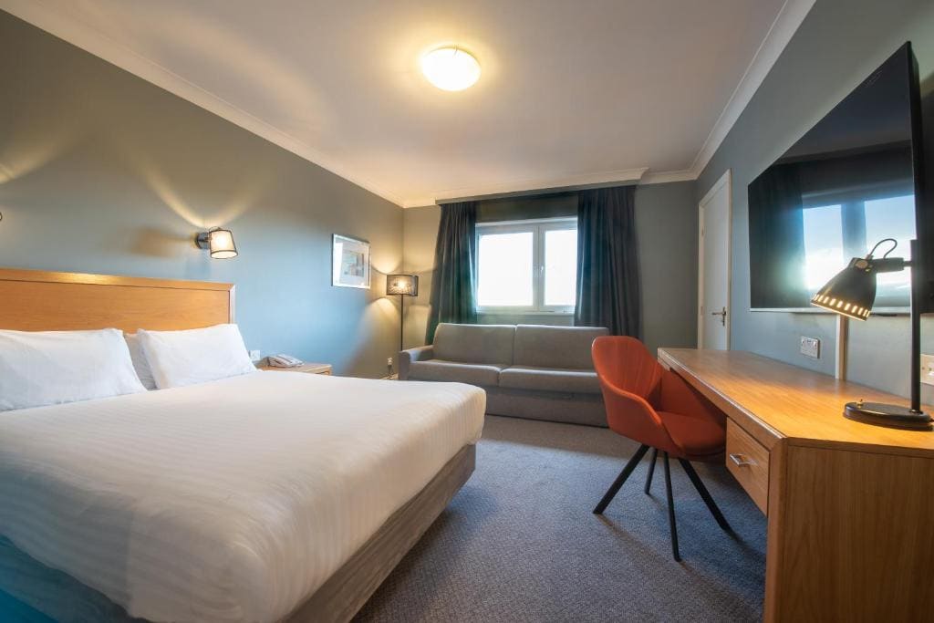 Standard Double Room with Double Bed and Two Single Sofa Beds room - Image 1