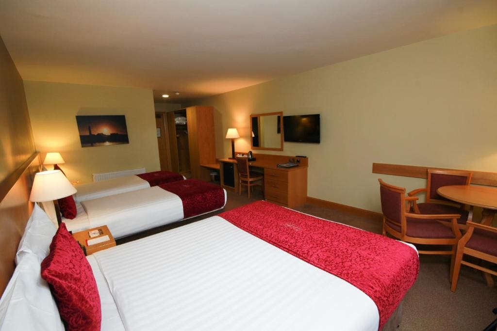 Superior Quad Room room - Image 1