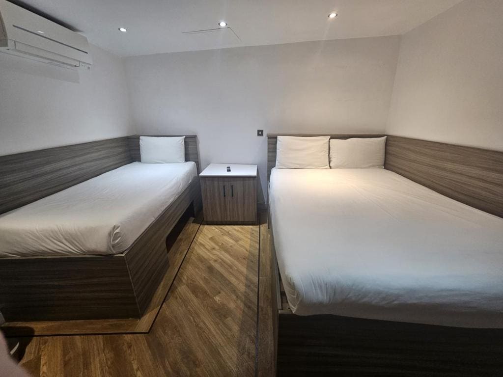 Triple Room (3 Adults) without window room - Image 3
