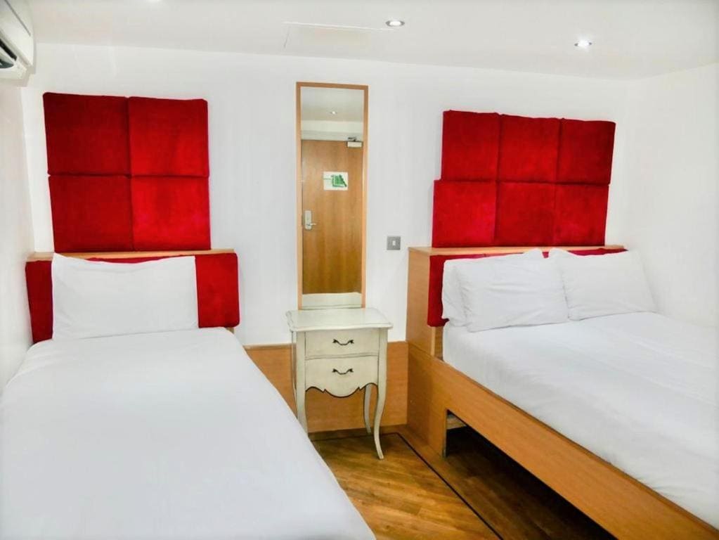 Triple Room (3 Adults) without window room - Image 2