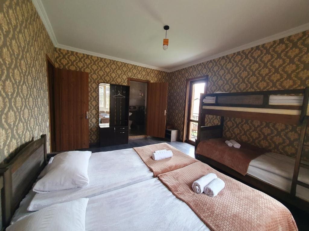 Quadruple Room with Balcony and Mountain View room - Image 2