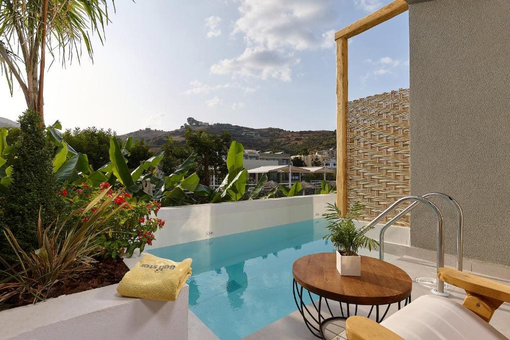 Junior Suite with Garden or Side Sea View & Sharing Pool room - Image 1