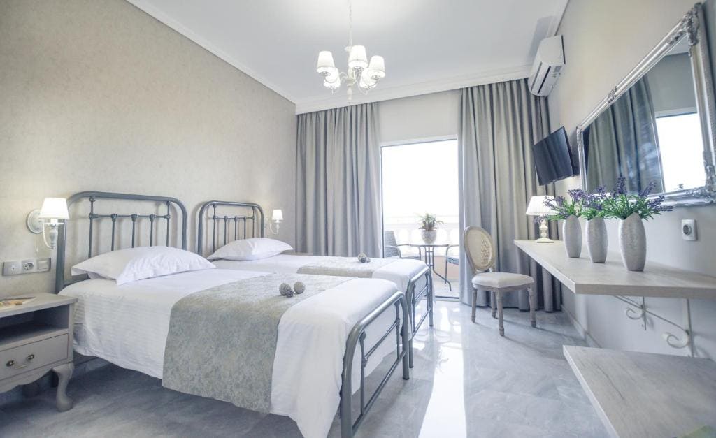 Deluxe Twin Room with Side Sea View room - Image 1