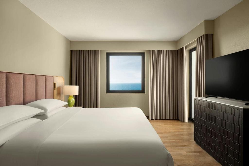 Aegean Suite, 1 Bedroom 2 room Suite, 1 King, Sofa bed room - Image 1