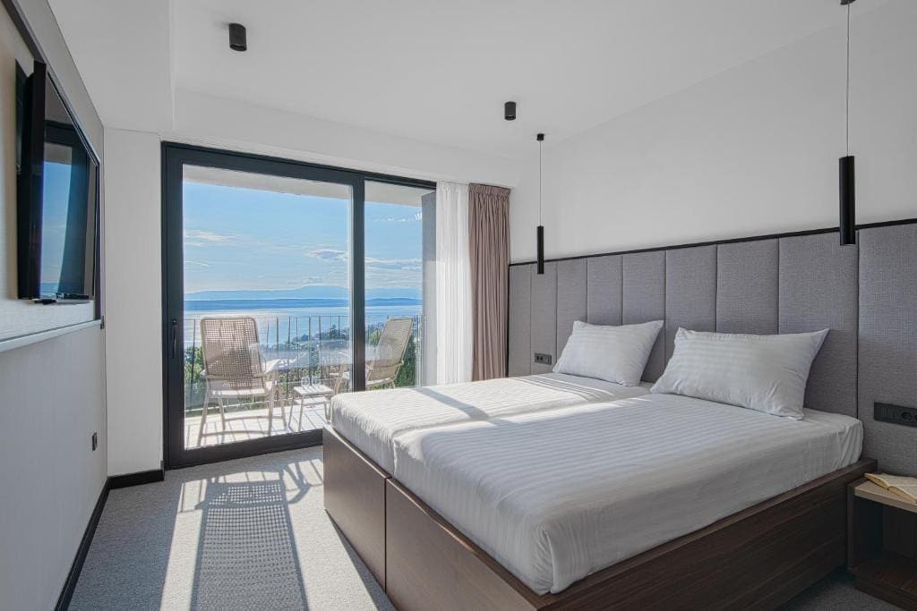 Superior Twin Room with Sea View and Balcony room - Image 2