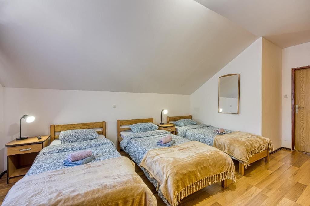 Quadruple Room with Private Bathroom room - Image 1