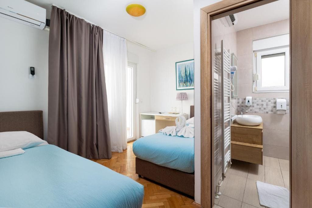 Twin Room with Balcony and Sea View room - Image 1