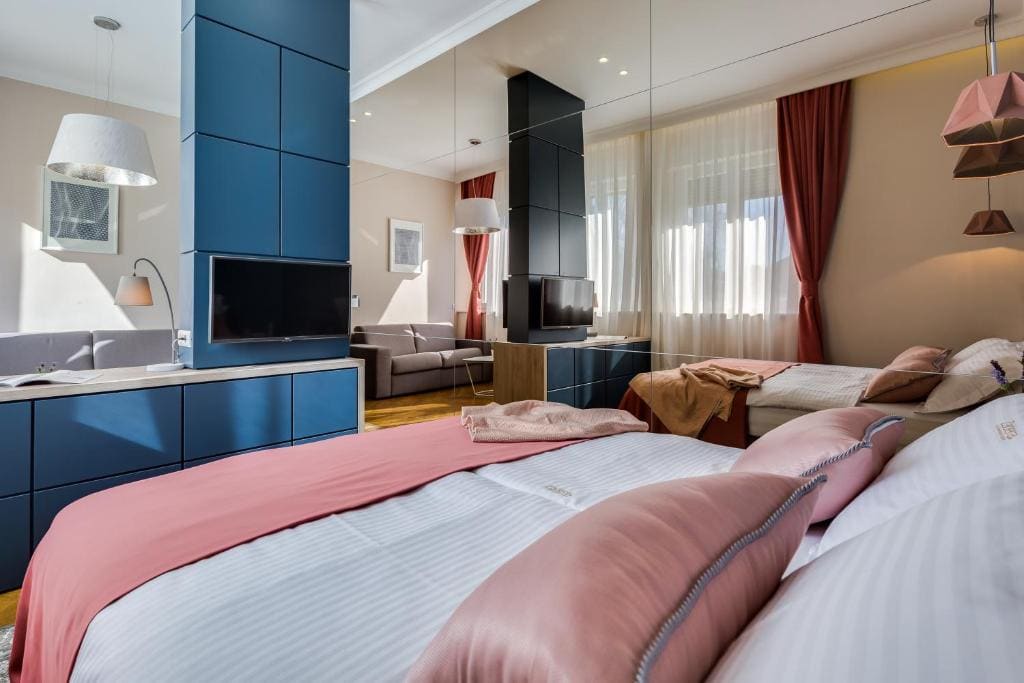 Deluxe Double Room with Sofa Bed room - Image 2