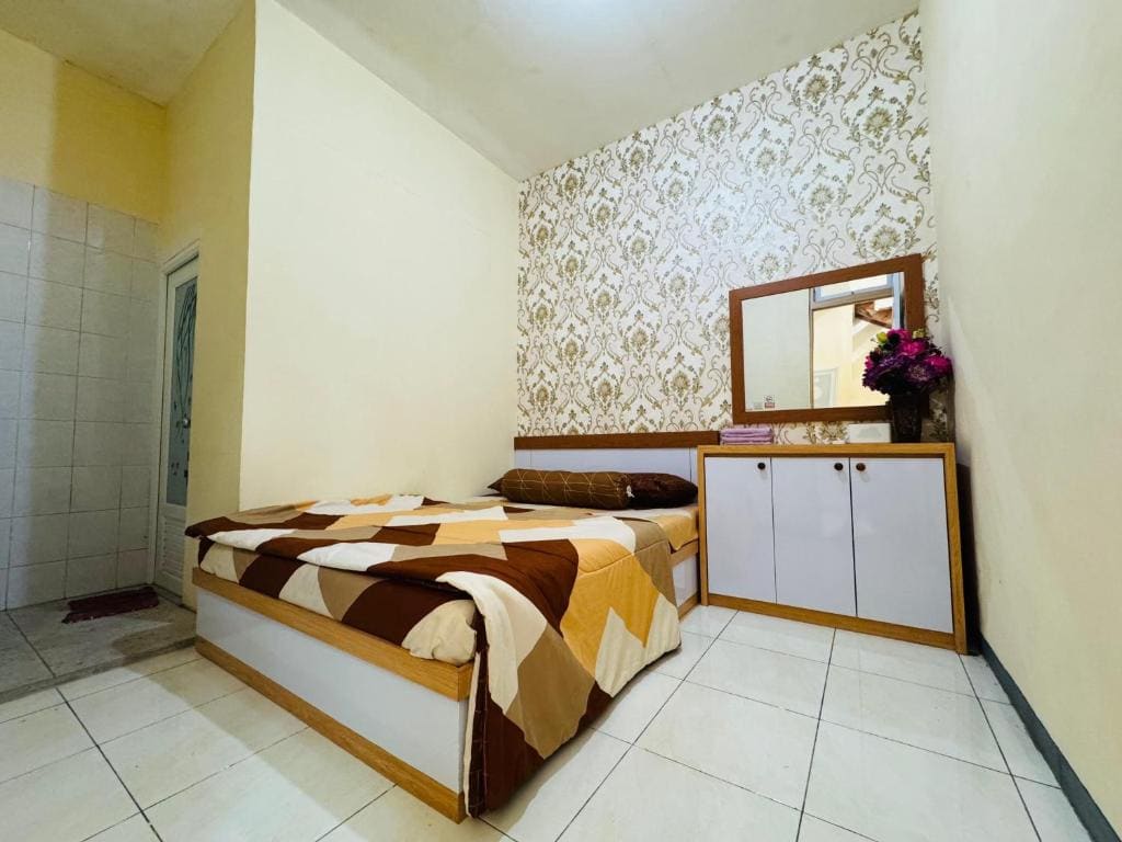 Three-Bedroom House room - Image 2
