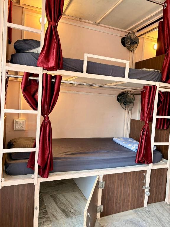 Bed in Male Dormitory Room room - Image 1