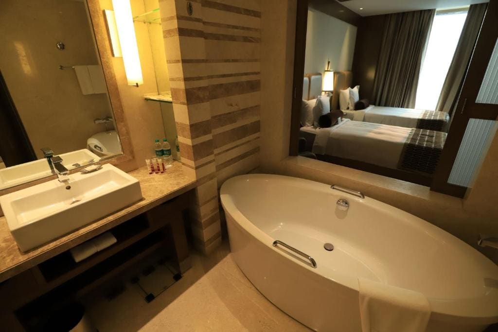 Standard Twin Room - Smoking Offers Buy1Get1 on Premium beverages between 11amto7pm and 15% discount on Food and Soft beverages, SPA and Laundry room - Image 1