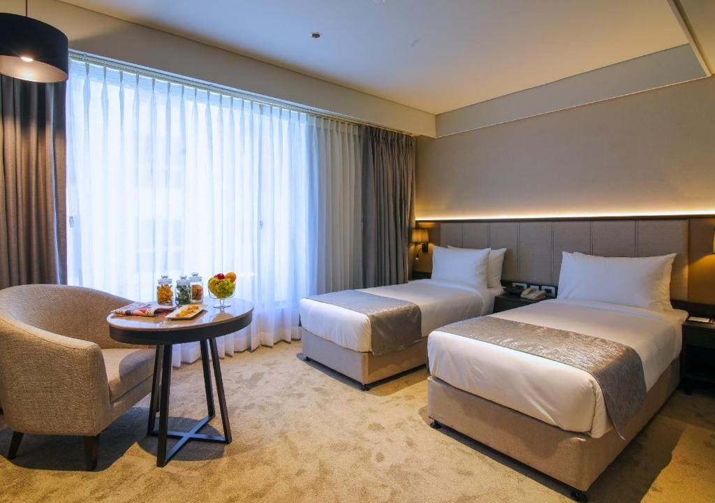 Deluxe Twin Room with 15% discount on Laundry Services room - Image 1