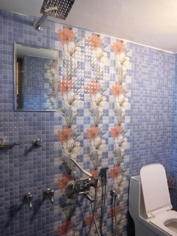 Quadruple Room with Private Bathroom room - Image 1