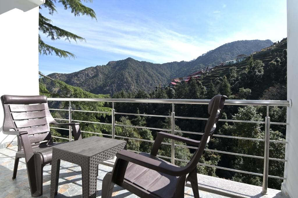 Super Deluxe Room With Balcony - View of Valleys and Mountains room - Image 1