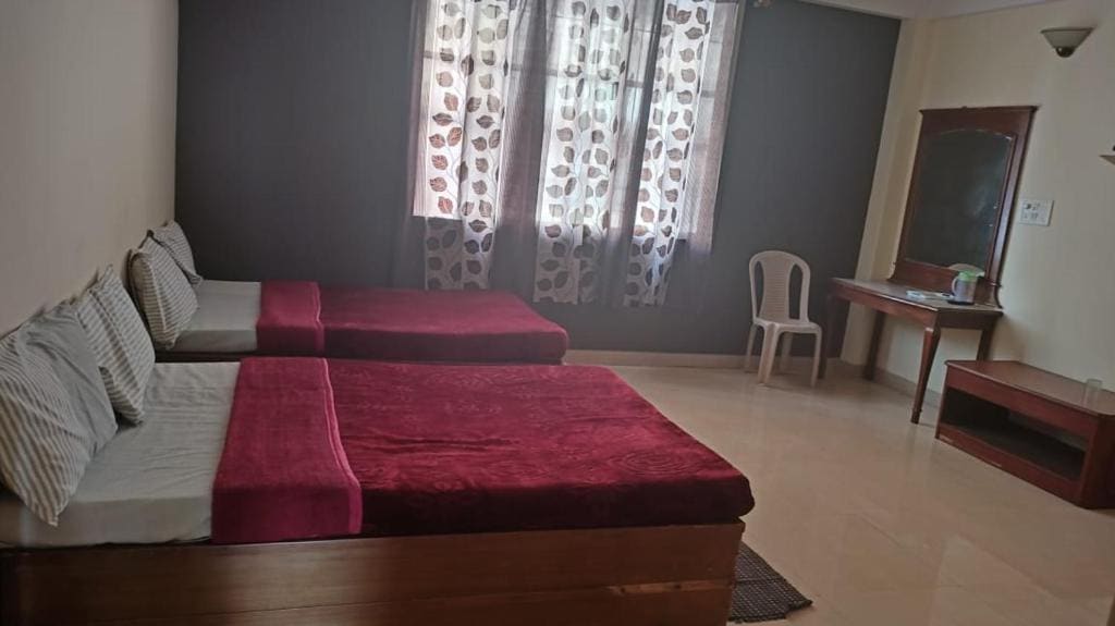 Deluxe Queen Room with Two Queen Beds room - Image 2