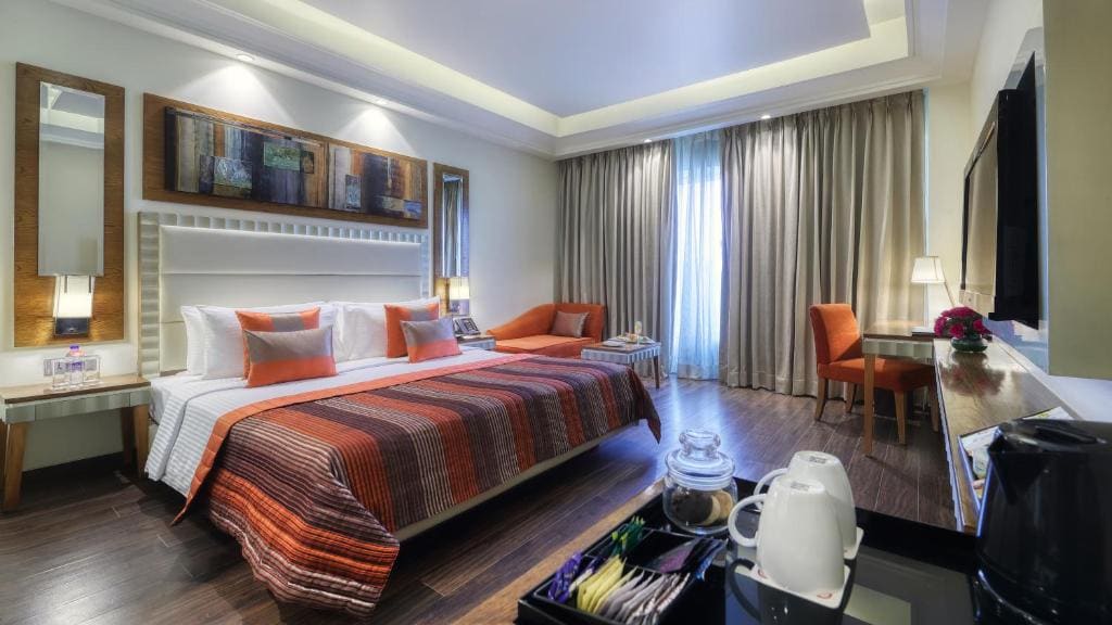 Premium Queen Room - Non-Smoking with 15 % OFF ON FOOD & Soft beverages/15% off on Laundry services//1+1 happy hours at Kokkinos from 6-8 pm on IMFL drinks// INR 500 SPA discount room - Image 1