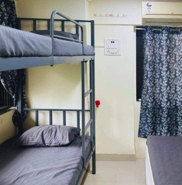 Bed in Male Dormitory Room room - Image 1