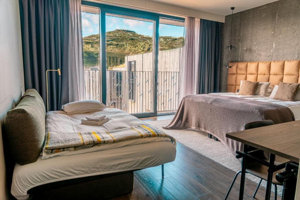 Deluxe Double Room with Sofa Bed room - Image 2